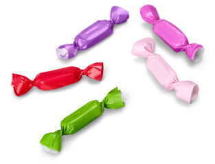Three wrapped candies or sweets on a white background