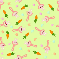 Seamless pattern with baby bunny rattle. Children's pattern on textiles. Gentle children's  green   background