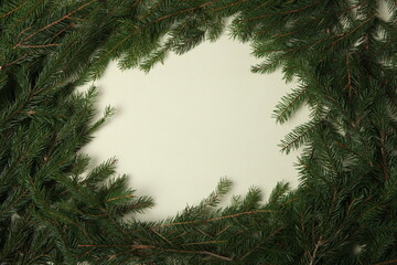 New Year's Eve background with fir branch and cones. Christmas and New Year holidays composition of pine tree branches.