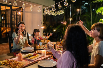 Big family having fun, enjoy party outdoors in the garden.	