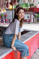 Asian girl at an amusement park