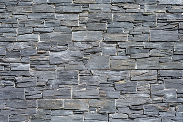Background from an old gray slate wall - obrazy, fototapety, plakaty