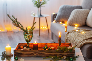 cozy home with christmas decor on wooden tray
