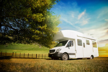 motorhome, caravan or campervan on natural background, vanlife concept, road trip idea. High...