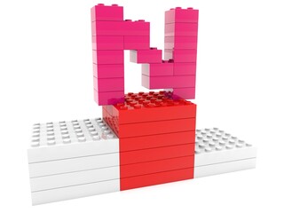 Letter N made of toy bricks at the top of the pedestal