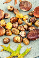 Peeled fried chestnuts, appetizing dessert.