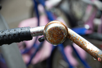 Close up details of a wet bike after rain, raindrop aesthetics. Amsterdam