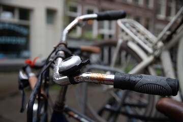 Close up details of a wet bike after rain, raindrop aesthetics. Amsterdam