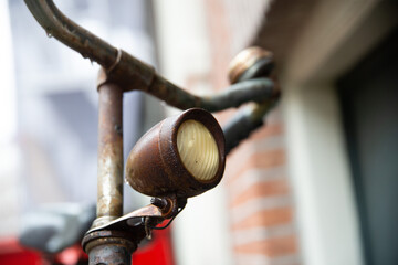 Close up details of a wet bike after rain, raindrop aesthetics. Amsterdam