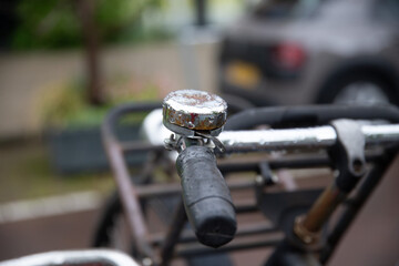 Close up details of a wet bike after rain, raindrop aesthetics. Amsterdam