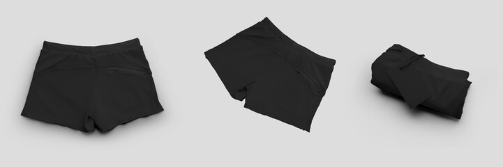 Set of black mockup male swimming trunks, subject close-up with ties, isolated on background.