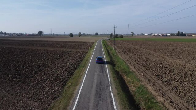 weekend traveling in rural scenery out of city Piacenza Italy drone video