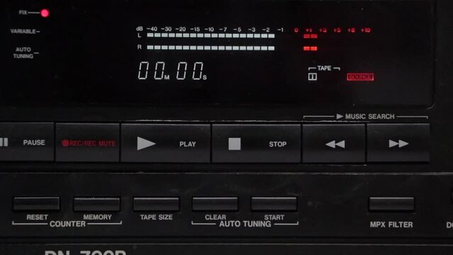 cassette player working in transmission room radio station on air broadcasting professional
