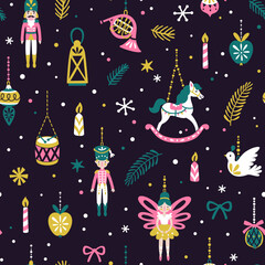 Vector Christmas seamless pattern with hanging Christmas ornaments, nutcracker, doll, rocking horse, candles and snowflakes. Holiday repeated texture with kids toys. Magical print. Nutcracker ballet.