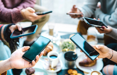 Friends group having fun using mobile smart phone chat - Detail of people hands phubbing content on social media network with smartphone - Genz technology concept with milenials online - Bright filter