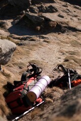 Backpack in mountain road in autumn
