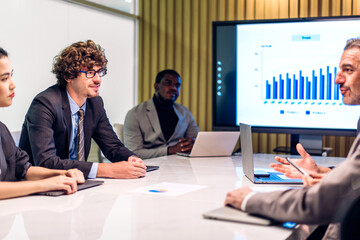 Group of business meeting and discussing strategy with startup project analysis finance process.Success business people plan and brainstorm marketing idea with document in office.Teamwork