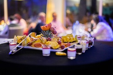 Plate of sliced fruits on a table