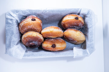doughnut Berliners cream chocolate handmade black plate