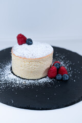 japanese cheese cake blueberry raspberry black plate sugar powder