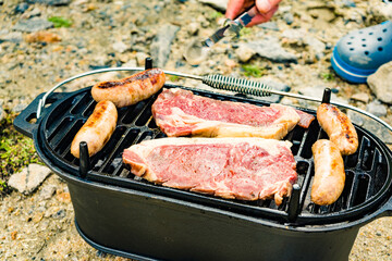 Grilled meat on barbecue grill