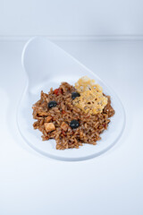 yellow paella risotto balck pearls parmessan cheese elegant dish