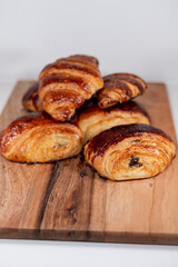 croissant, pain au chocolat bakery french dessert wood board 