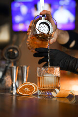 making cocktails at the bar