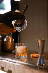 making cocktails at the bar