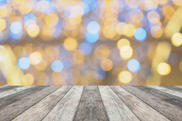 Naklejka na ściany i meble Empty wood table top with blur Christmas tree with bokeh light background