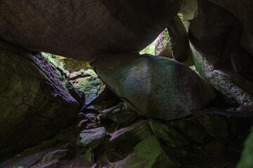 Cave inside the fairy tale forest of Huelgoat, Brittany, France