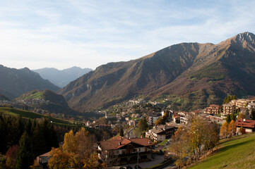 Fototapeta na wymiar View on Serina Valley in Autumn, Italian Alps