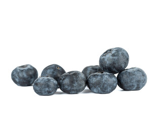 Several blueberries or swamp blueberries on a white background.