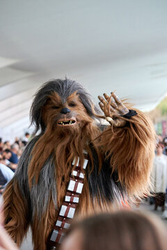VALENCIA, SPAIN - OCTOBER 2022: Chewbacca waving during Star Wars reenactment.