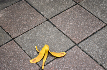 Banana peel on the sidewalk
