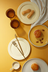 Sweet cake dessert on the yellow table. Design menu. Set up breakfast table. 