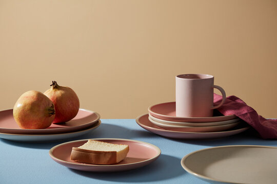 Restaurant interior mock-up. set of pink dishes and cups. 