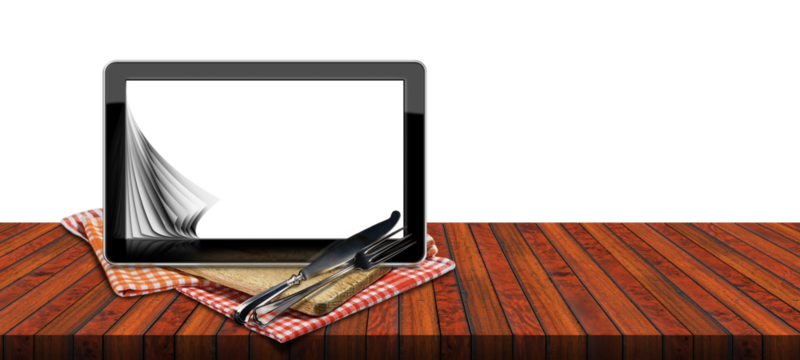 Blank digital tablet computer with white or transparent screen for recipes or food menu. On a wooden kitchen counter with a cutting board, checkered tablecloth and silver cutlery, png. - Powered by Adobe