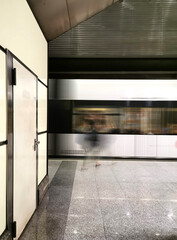 Metro station. Person on the move using public transport.
