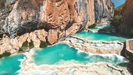 Natural pools of Millpu in Huancaraylla. Turquoise lagoons near Ayacucho, travel destination in Peru
