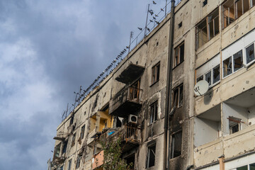 War in Ukraine. 2022 Russian invasion of Ukraine. An apartment building destroyed by shelling. Destruction of infrastructure. Terror of the civilian population. War crimes