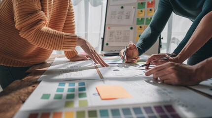 Team ux designer creative graphic planning application development a prototype smartphone layout.