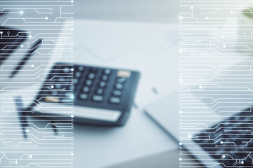 Abstract virtual micro chip hologram on blurry calculator and computer background, artificial...