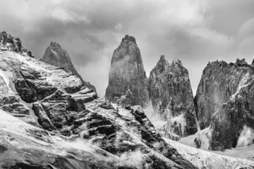 Foto auf Glas Torres del Paine peaks coming from clouds © Fyle