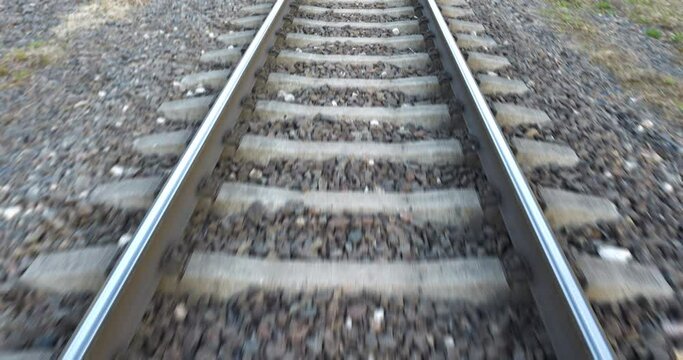4K - Fast movement on a railways. High-speed a railway track