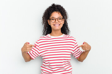 Young african american woman isolated points down with fingers, positive feeling.