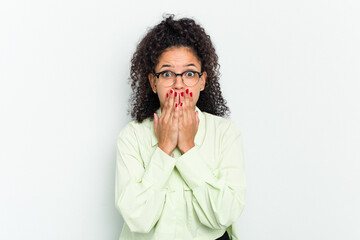 Young african american woman isolated covering mouth with hands looking worried.