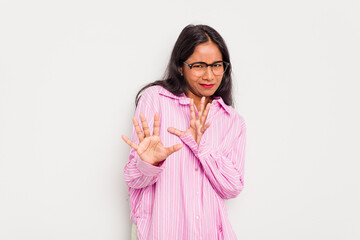 Young Indian woman isolated on white background rejecting someone showing a gesture of disgust.