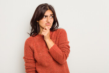 Young Indian woman isolated on white background suffers pain in throat due a virus or infection.