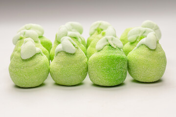 Green marshmallow candy isolated on  white background.